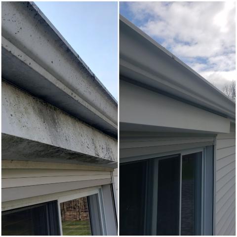 This trim has been restored to remove dirt and grime, leaving a clean look to this roofline.